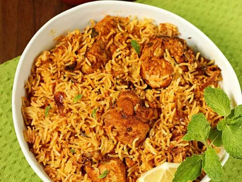 Chicken Biryani served in a white bowl